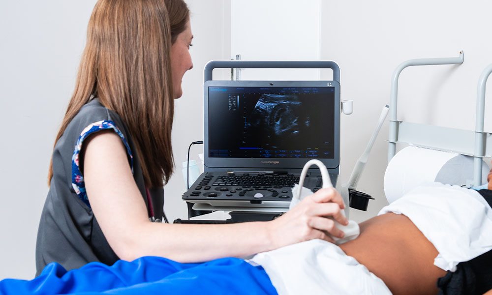 Dr Tanya Webber performing ultrasound scan on patient