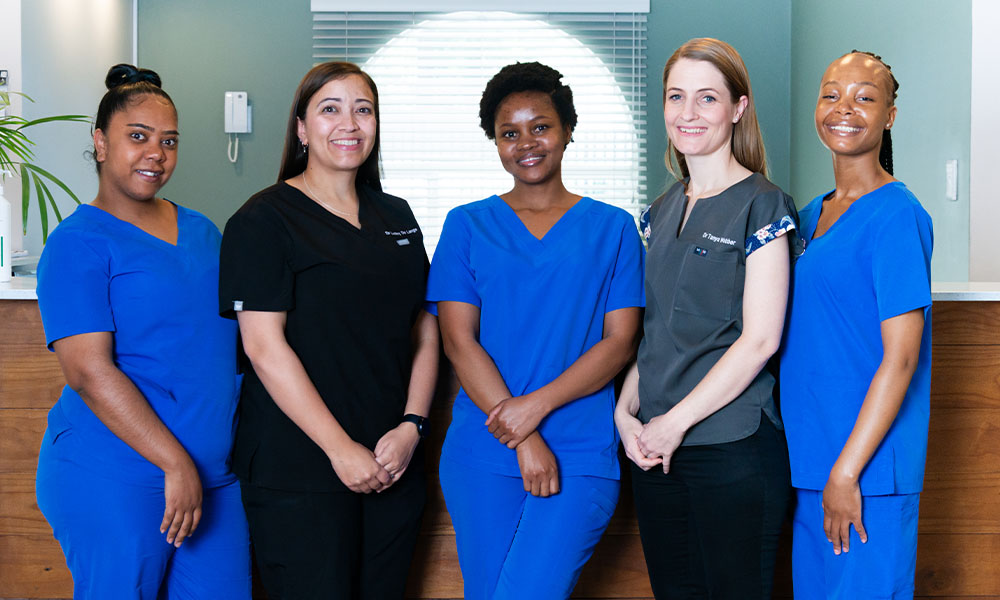 MedNova team standing in front of counter