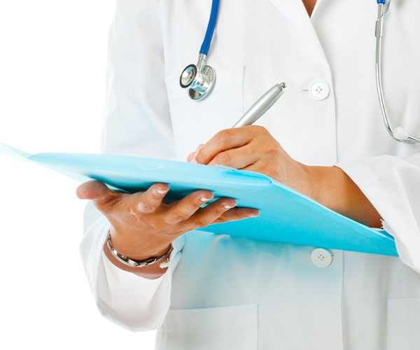 General practitioner (GP) holding a notepad